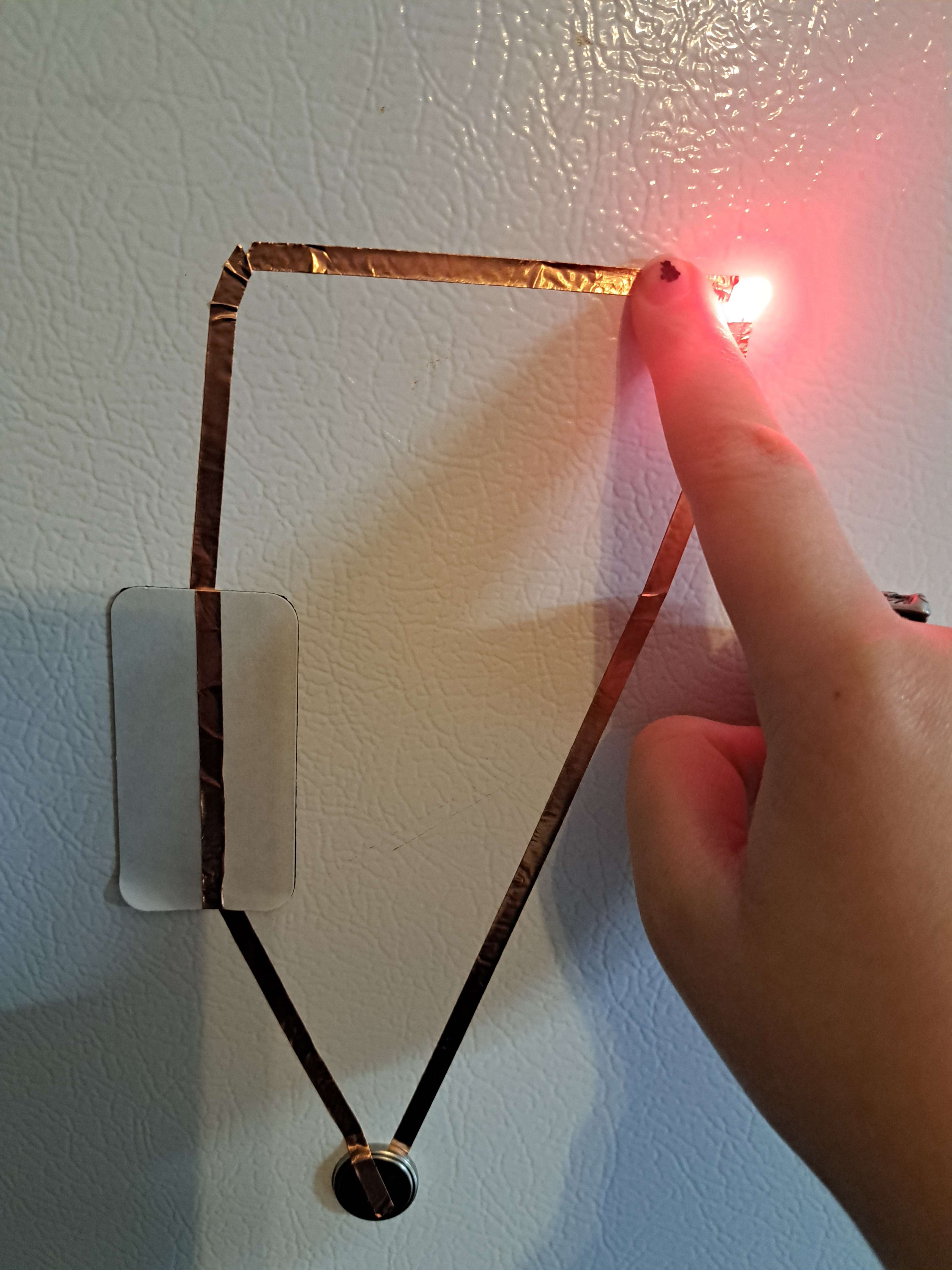 the magnet does hold the copper tape strongly enough, though