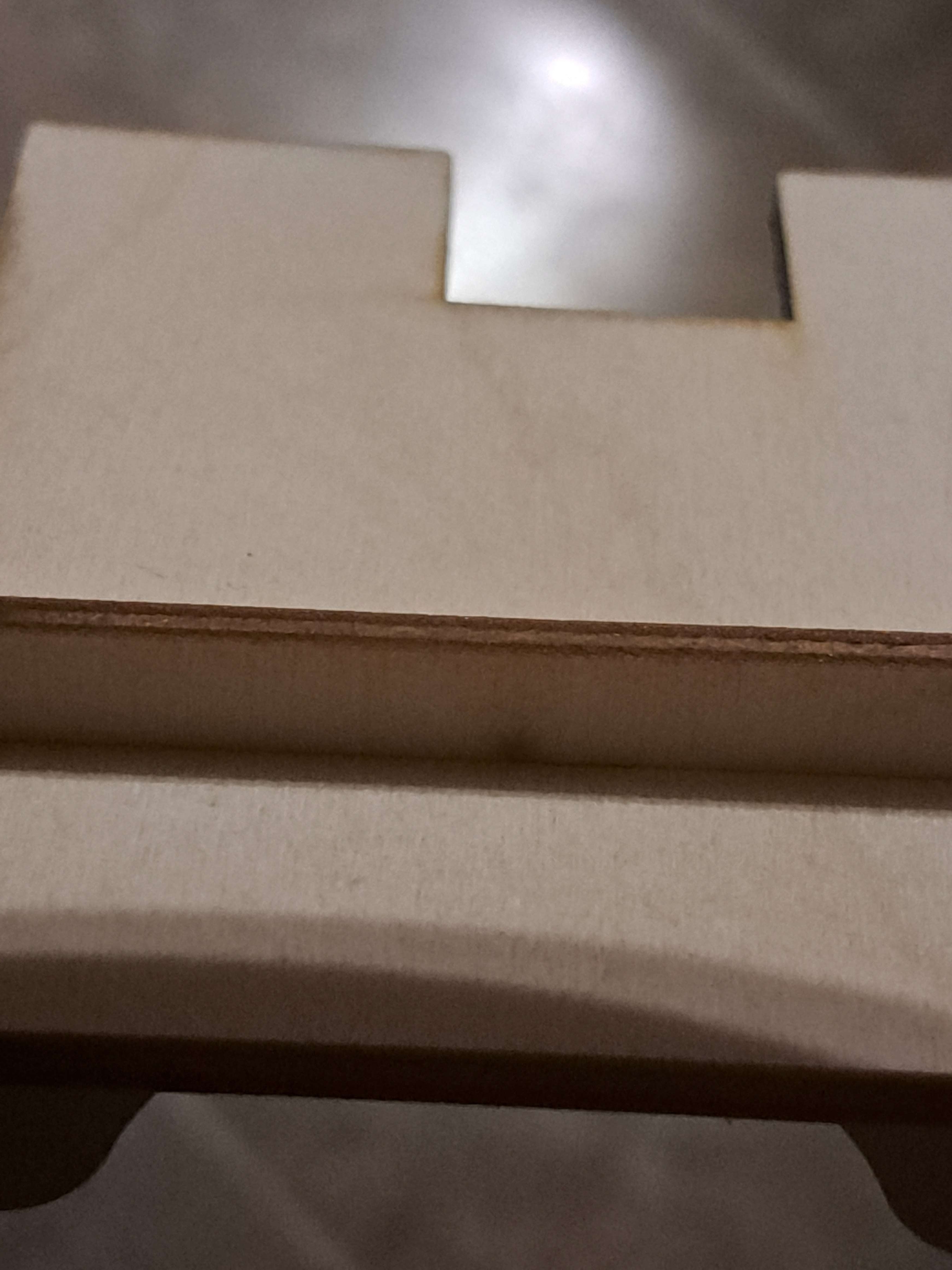 small mark in corner of piece