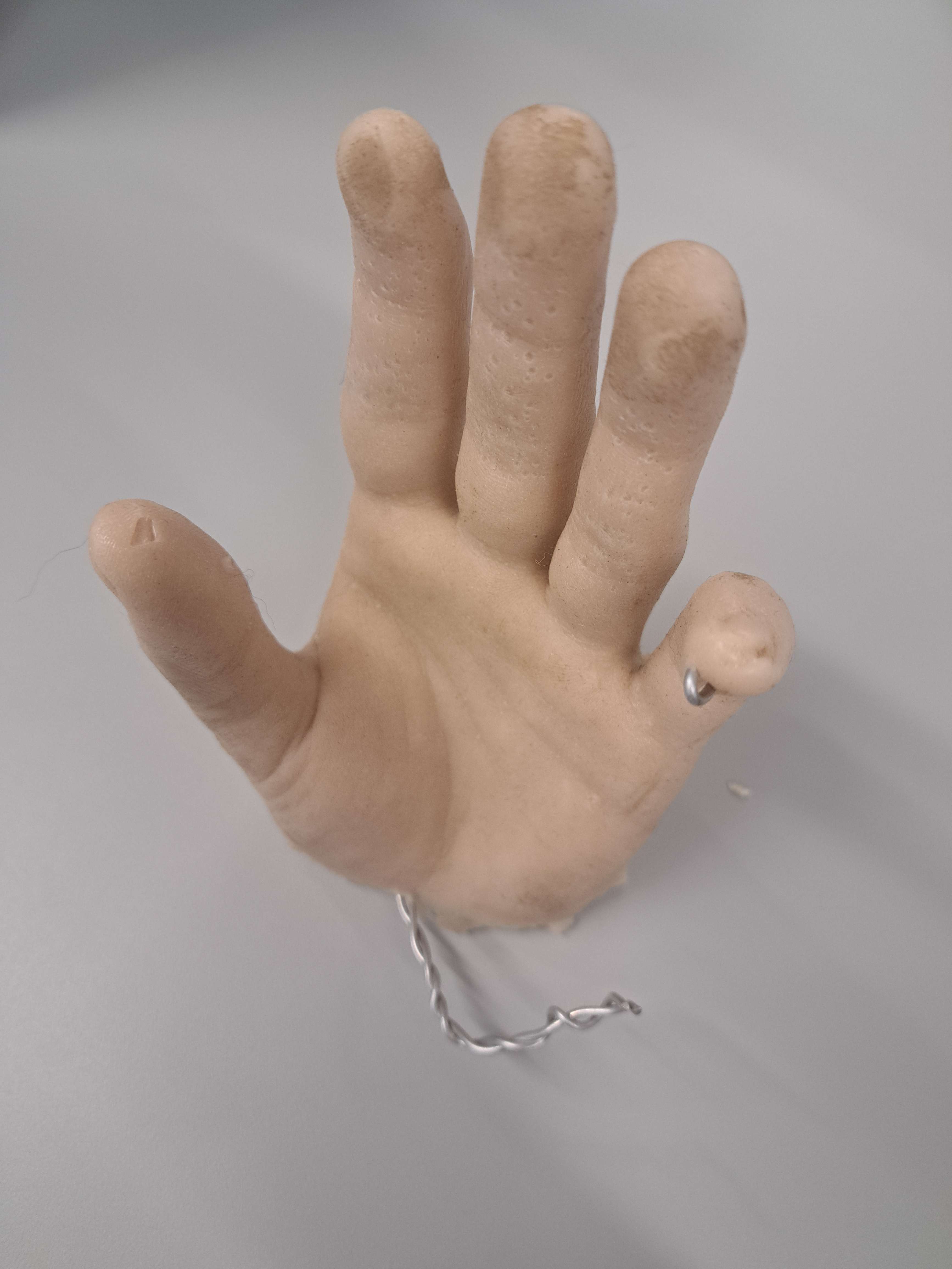 Plastic<br>Characteristics: refined, smooth & sticky, pliable/squishy, beige<br>Uses: molding, modelling